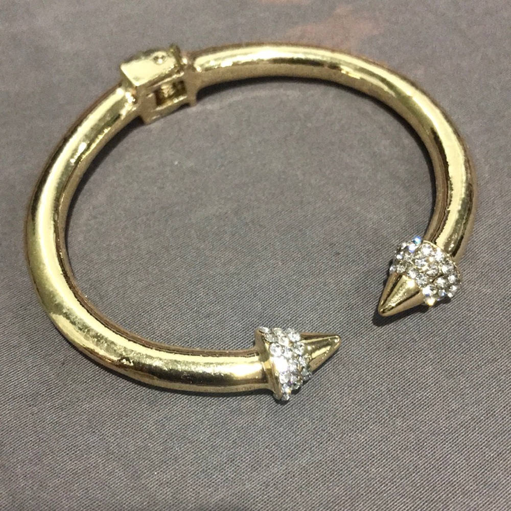 Spike gold bracelet with rhinestones